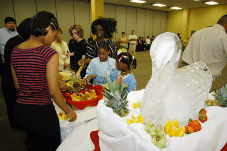 Well over four hundred people attended the reception in Coburn Dining Room prior to the August graduation ceremony.  - Photo by Morris Abernathy