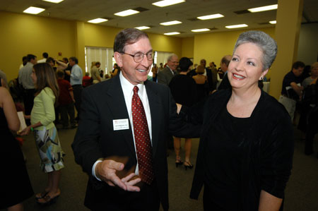 Dean of the College of Education and Human Studies Tom Rosebrough chats with Ed.D. graduate Debbie Joy at the graduate reception. - Photo by Morris Abernathy