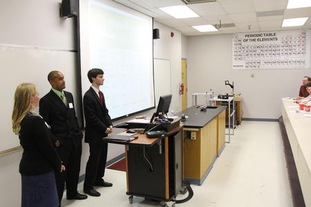 Alex Wainscott, Grace Morriss, and William Murray, senior engineering majors, present their project for the 11th Annual Scholarship Symposium. - Photo by Matt McDaniel