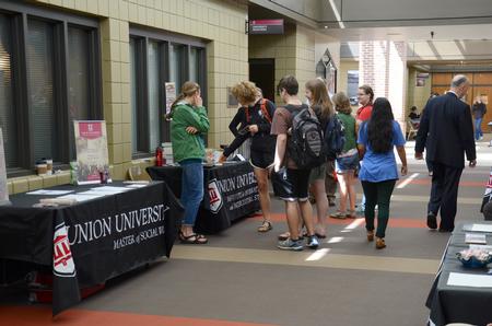 Students gather during the Graduate Degree Informational Fair in the Student Union Building. - Photo by MiKalla Cotton