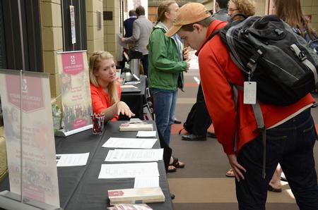 Thomas Griffith, sophomore biology major, takes interest during the Graduate Degrees Informational Fair in the Student Union Building. - Photo by MiKalla Cotton