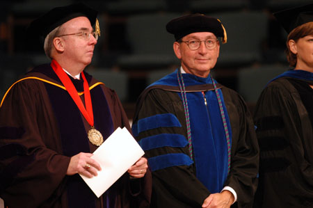 Dr. David S. Dockery and Dr. Thomas R. Rosebrough in full regalia during the summer graduation ceremony. - Photo by Morris Abernathy