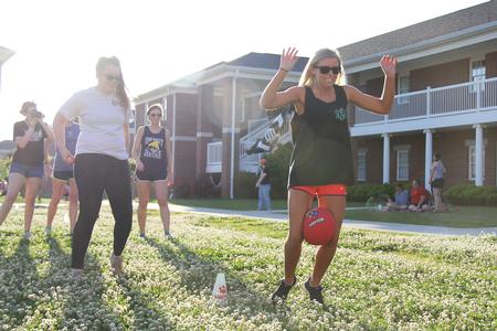 Anna Claire Sewell, freshman education major, races in the relay race at the Union Field Day event presented by Residence Life.  - Photo by Matt McDaniel