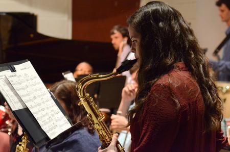 Abby Williams, senior english and music double major, performs at the Jazz Band concert in Hartley Recital Hall. - Photo by MiKalla Cotton