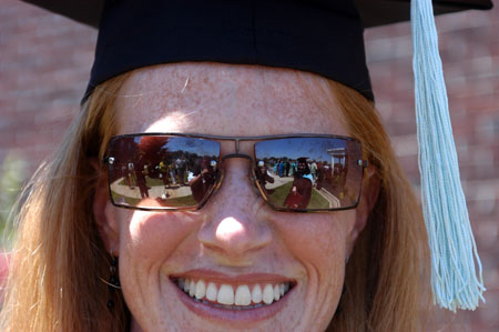 After earning her master of education degree, Melissa Farmer pauses to reflect on summer gradution at West Jackson Baptist Church.  - Photo by Morris Abernathy
