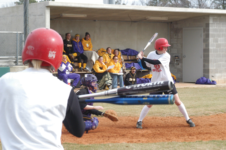 NAIA All-American Leah Gronberg (10) waited for the pitch during a scrimmage game against Bethel College. - Photo by Lindsay Stavish