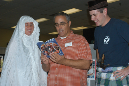 Missionary in Residence Tommy Tucker shares effective mission strategies with junior Sarah Beth Quinton and freshman Josh Wilkerson. - Photo by Jonathan Blair