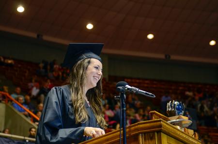 Holly Harris, senior class president and TESL graduate, addresses her fellow graduates, faculty, staff, family and friends at the 189th Spring Commencement Services. - Photo by Kathleen Murray