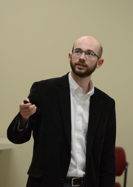 Ward Howard, senior physics major, presents research on molecular dynamics at the annual Scholarship Symposium. - Photo by Jacob Moore