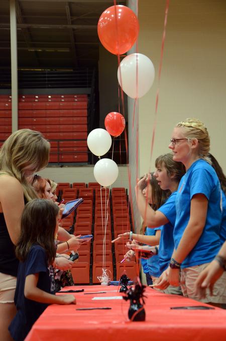 Resident Advisors assist students in finding their room assignments  during move-in day. - Photo by Amanda Rohde