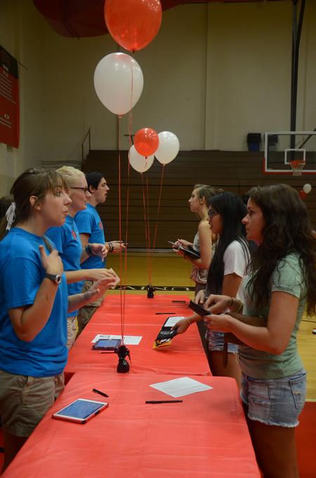 New students receive their keys from RAs on move-in day. - Photo by Meg Rushing
