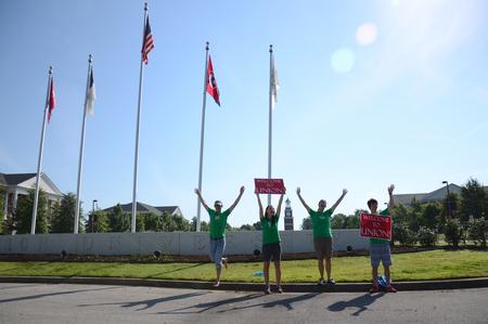 Life Group leaders Johnny Fulks, Kristine Burgess, Paige Tang and Zachary Taw welcome new students on move-in day. - Photo by MiKalla Cotton