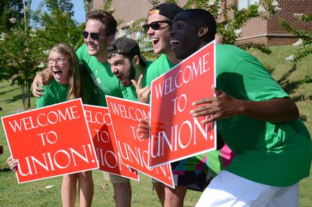 Life Group leaders get excited for the arrival of new students on move-in day. - Photo by MiKalla Cotton