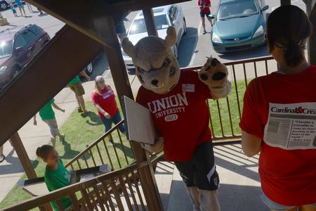 Buster the Bulldog helps new students move into their rooms. - Photo by Emily Stookey