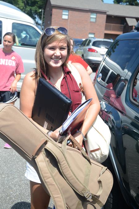 Courtney Stookey, freshman TESL major, unloads her car on move-in day. - Photo by Emily Stookey