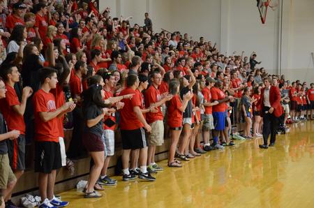 Willie Louth, junior economics major, leads new students in a cheer at the Focus Spirit Rally Run in the Fred DeLay Gymnasium during Focus weekend. - Photo by MiKalla Cotton