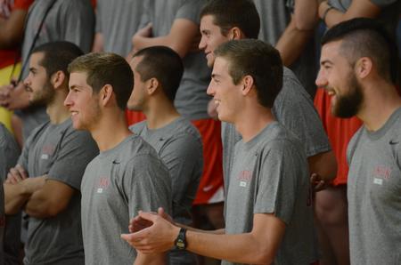 Bulldog soccer players Zach Crane, junior athletic training major, Clayton Martin, junior sports management major, and Matt Kesler, junior philosophy major, enjoy the Focus Spirit Rally Run in the Fred DeLay Gymnasium. - Photo by Emily Stookey
