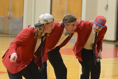 Will Spicer, senior political science major, Willie Louth, junior economics major, and Hunter Hawes, senior Biblical studies major, are introduced as this year's "Fred Fanatics" during the Focus Spirit Rally Run in the Fred DeLay Gymnasium. - Photo by Emily Stookey