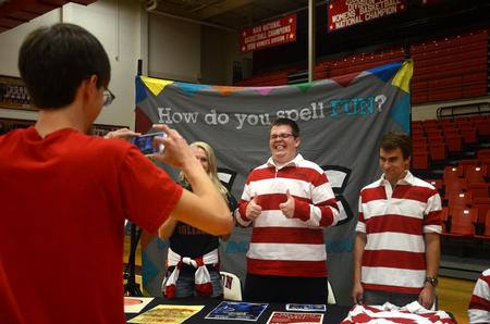 Jared Dauenhauer, assistant director of student leadership & engagement, takes of photo of SAC members at the SAC Focus Fest. - Photo by Meg Rushing