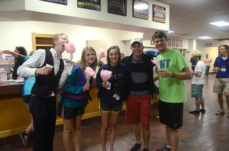 New students enjoy cotton candy at the SAC Focus Fest in the Fred DeLay Gymnasium. - Photo by Meg Rushing