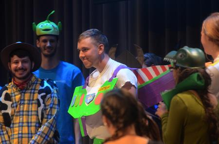 Haaken Magnuson, senior biology major, performs as Buzz Lightyear during "RA Story." - Photo by Amanda Rohde