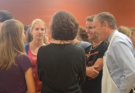 New students gather around Dr. Dub Oliver, president of the university, at the ice cream social in the Bowld Commons during Focus. - Photo by Amanda Rohde