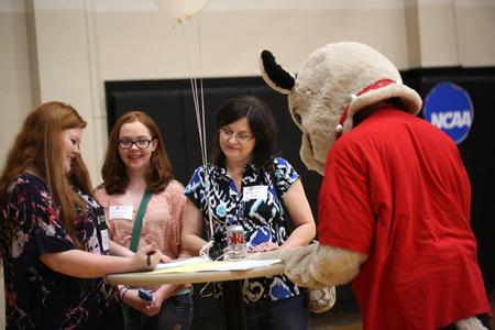 Buster the Bulldog mingles with new students and their families during move-in day. - Photo by Kristi McMurry Woody