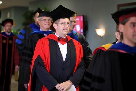 Ray Van Neste, professor of Biblical studies, processes into chapel prior to Convocation. - Photo by Kristi McMurry Woody