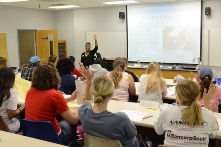 Renee Jones, Associate Director of the Vocatio Center, speaks at the Backpack to Briefcase: Résumé Writing and Interviewing Skills Seminar in classroom A-7 of the PAC - Photo by MiKalla Cotton