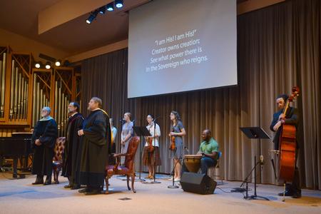 Students open chapel with song before Hal Poe, Chuck Colson professor of faith and culture, gives the first sermon in the Faculty of the Year series in the G. M. Savage Memorial Chapel. - Photo by Emily Stookey