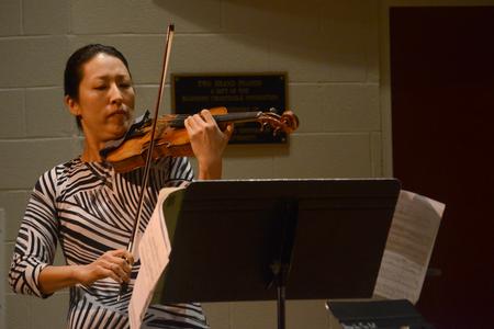 Guest violinist Soh-Hyun Altino performs at Hartley Recital Hall.  - Photo by Meg Rushing