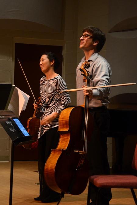 Leonardo and Soh-Hyun Altino take a bow following their guest recital performance in Hartley Recital Hall. - Photo by Meg Rushing