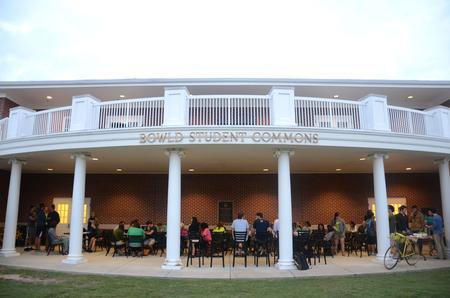 Students gather to share and hear about 2014 summer GO Trips on the Bowld Student Commons patio. - Photo by Meg Rushing