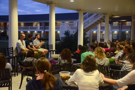 Students gather to share and hear about 2014 summer GO Trips to Central Asia and New York City on the Bowld Student Commons patio. - Photo by Meg Rushing
