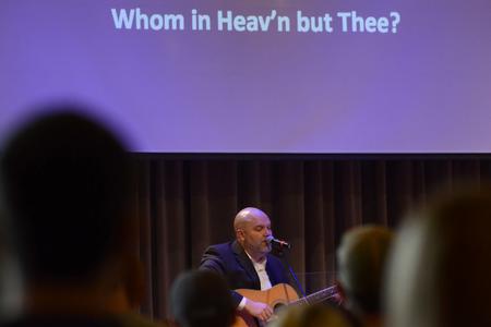 Russ Pflasterer, pastor of City Fellowship Church, leads worship in chapel during GO Week. - Photo by MiKalla Cotton