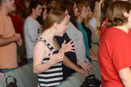 Miranda Stoops, junior psychology major, worships with other students in chapel during GO Week. - Photo by MiKalla Cotton