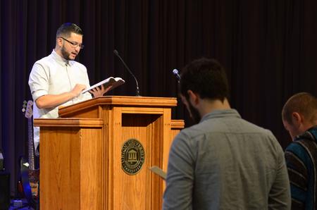 D.A. Horton, National Coordinator for Urban Students at the North American Mission Board, reads scripture in the opening of his message in chapel during GO Week. - Photo by MiKalla Cotton