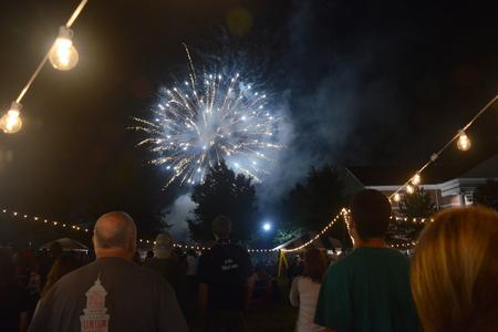 Students and their families enjoy the fireworks show to end this year's Family Weekend. - Photo by Emily Stookey