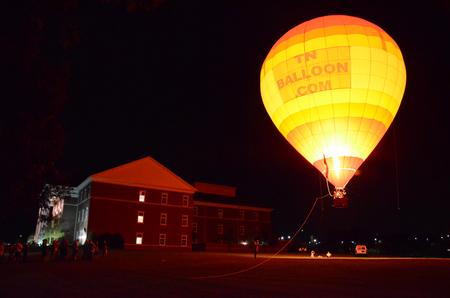 Students and their families enjoy a tethered hot air balloon ride at Union Night during Family Weekend. - Photo by MiKalla Cotton