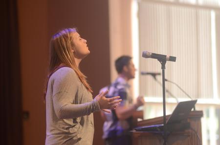 Stephanie Olford, sophomore psychology major, helps lead worship in chapel. - Photo by Amanda Rohde
