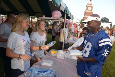 Guests of Family Weekend and Union Night pick up their meals at the ZETA shrimp boil fundraiser. - Photo by Morris Abernathy