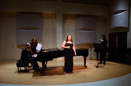 Holly Jackson, senior music performance major, performs "If You Were Coming in the Fall" by Barbara Harbach. - Photo by Amanda Rohde