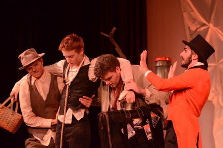 Estragon, played by Nick Fleming, and Vladimir, portrayed by Matthew Wallace, help Lucky, played by Samuel Edgren, stay on his feet with the unwanted assistance of Pozzo, portrayed by Christian Al-Hagal, in a scene from "Waiting for Godot." - Photo by Emily Stookey
