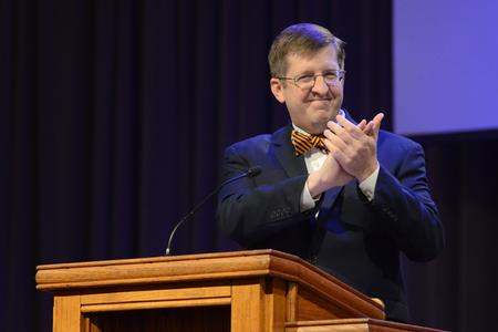Ray Van Neste, professor of biblical studies, welcomes prospective students to chapel on Preview Day.  - Photo by Emily Stookey