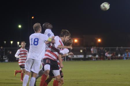 Kim Lunardelli, senior business administration major, heads the ball out of reach of Shorter University. - Photo by Amanda Rohde