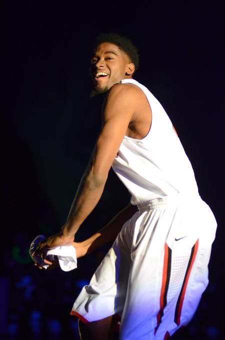Senior guard Marterrace Brock throws a shirt to the crowd at Bulldog Madness. - Photo by Meg Rushing