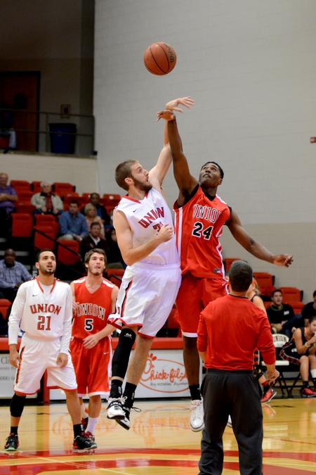Junior forward, Eric Leisey, and sophomore guard, Ashanti Day, tip off the men's intersquad scrimmage at Bulldog Madness. - Photo by Meg Rushing