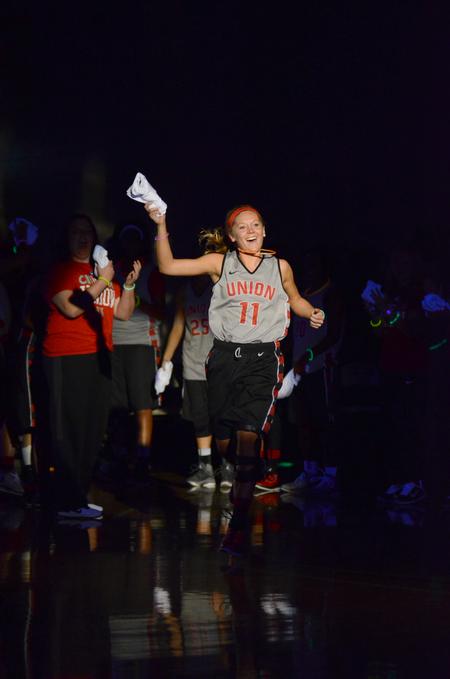 Senior guard Emily Sissom throws a shirt to the crowd at Bulldog Madness. - Photo by Meg Rushing