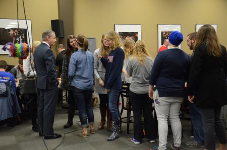 Students celebrate and mingle during a fiesta in honor of the upcoming inauguration of Dub Oliver, president of the university, in Brewer Dining Hall. - Photo by MiKalla Cotton