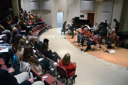 Kaitlyn Pindak, senior music education major, sings "Fly Me to the Moon" at the Jazz Band Concert. - Photo by Amanda Rohde